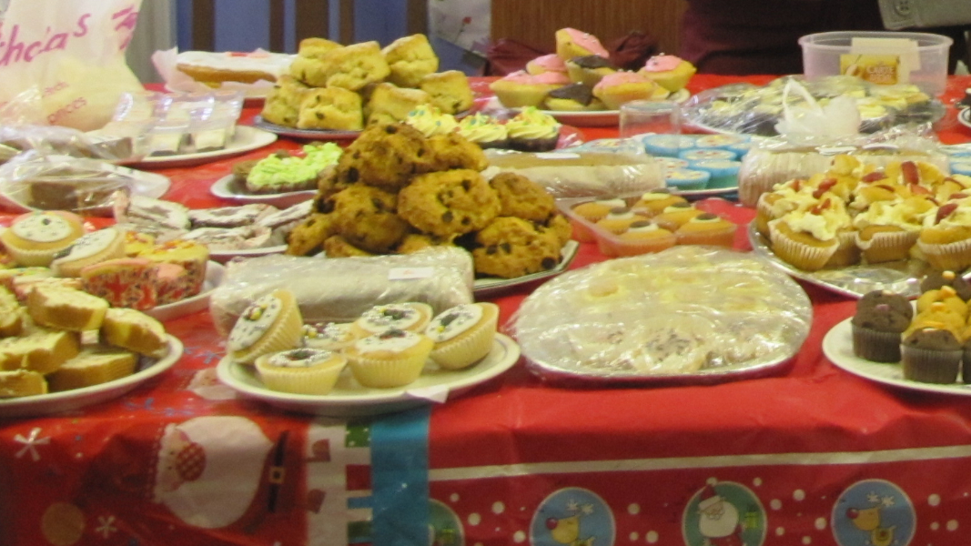 Photograph showing a variety of food and drink on a table