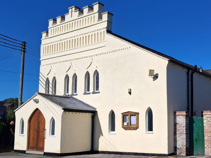 Picture of the front entrance and path to Our Blessed Lady & St. John The Baptist Catholic Church